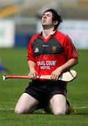 10 June 2007; Jonathan McCusker, Down, sinks to the ground under the glare of the sun. Leinster Junior Hurling Shield Replay, Down v Longford, Pairc Esler, Newcastle, Co. Down. Picture credit: Oliver McVeigh / SPORTSFILE