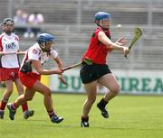 10 June 2007; Fionnuala Carr, Down, in action against Aishling Diamond, Derry. Ulster Junior Camogie Final, Down v Derry, Pairc Esler, Newcastle, Co. Down. Picture credit: Oliver McVeigh / SPORTSFILE