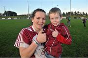 16 November 2014; Geraldine McLaughlin, Termon celebrates with her nephew Oran Halley after the game. TESCO HomeGrown All-Ireland Ladies Football Senior Club Championship Semi-Final, Kilkerrin-Clonberne v Termon, Clonberne GAA Pitch, Clonberne, Co. Galway. Picture credit: Ray Ryan / SPORTSFILE