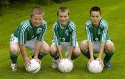 25 June 2006; Former Republic of Ireland star and 'Godfather' to this year's Irish team, Denis Irwin, met once again with the talented young Cherry Orchard team who will travel to Lyon to represent Ireland in less than a week's time at the Danone Nations Cup World Final. Irwin took the young team under his wing one last time to pass on his expertise and vast knowledge of International soccer. Pictured are, from left, Daniel O'Reilly, Seadna McGrillen, and Kenneth Forrest, all from Kildare. AUL Complex, Clonshaugh, Dublin. Picture credit: Brendan Moran / SPORTSFILE