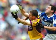 1 July 2007; Paddy Colfer, Wexford, in action against Cathal Ryan, Laois. Bank of Ireland Leinster Senior Football Championship Semi-Final, Laois v Wexford, Croke Park, Dublin. Picture credit: David Maher / SPORTSFILE