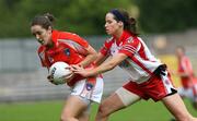 1 July 2007; Caroline O'Hanlon, Armagh, in action against Sarah Donnelly, Tyrone. TG4 Ladies Ulster Senior Football Championship Final, Armagh v Tyrone, St Tighearnach's Park, Clones, Co. Monaghan. Picture credit: Oliver McVeigh / SPORTSFILE