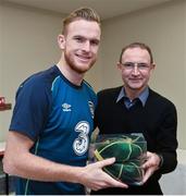 17 November 2014; Alex Pearce is presented with his senior international cap by Republic of Ireland manager Martin O'Neill. Republic of Ireland Squad Caps Presentation, Portmarnock Hotel & Golf Links, Portmarnock, Co. Dublin Picture credit: David Maher / SPORTSFILE