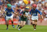 1 July 2007; 'Gearing Up for Cœl Camps', pictured playing for the Vhi Cœl Camps Team in Croke Park on Sunday is Darragh Pepper from St. Aidens NS, against Bill McDowell, Callan BNS, right, and Niall O'Gorman, Urlingford NS, right. Guinness Leinster Senior Hurling Championship Final, Kilkenny v Wexford, Croke Park, Dublin. Picture credit: Pat Murphy / SPORTSFILE