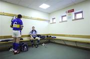 5 July 2007; Tipperary hurler Benny Dunne, left, and Dublin hurler Kevin Flynn get changed before a GAA Unrivalled photocall in Parnell Park ahead of their Guinness All-Ireland Hurling Championship Qualifier on Saturday next. Parnell Park, Dublin. Picture credit: Brendan Moran / SPORTSFILE