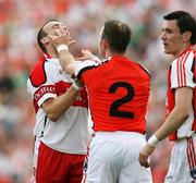 8 July 2007; Tensions arise between Enda McNulty, Armagh, and Paddy Bradley, Derry. Bank of Ireland All-Ireland Senior Football Championship Qualifier, Round 1, Armagh v Derry, St Tighearnach's Park, Clones, Co. Monaghan. Picture credit: Oliver McVeigh / SPORTSFILE