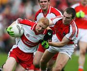 8 July 2007; Colin Devlin, Derry, in action against Brendan Donaghy, Armagh. Bank of Ireland All-Ireland Senior Football Championship Qualifier, Round 1, Armagh v Derry, St Tighearnach's Park, Clones, Co. Monaghan. Picture credit: Oliver McVeigh / SPORTSFILE