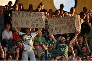 22 November 2014; Cathal O'Reilly, Shercock, Co. Cavan, left, and Patrick Sheehan, Tallow, Co Waterford, make a point on water charges at the game. Virgin Australia International Rules Series, Australia v Ireland. Paterson's Stadium, Perth, Australia. Picture credit: Ray McManus / SPORTSFILE