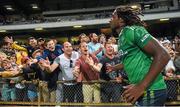 22 November 2014; Australia fans celebrate with Nic Naitanui after the game. Virgin Australia International Rules Series, Australia v Ireland. Paterson's Stadium, Perth, Australia. Picture credit: Ray McManus / SPORTSFILE