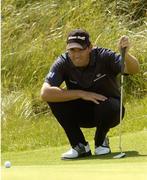 12 July 2007; Padraig Harrington lines up his putt on the 11th green. Irish PGA Golf Championship, 2nd Round, European Club Golf Club, Brittas Bay, Co. Wicklow. Picture credit: Matt Browne / SPORTSFILE