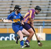 14 July 2007; Ursula Jacob, Wexford, in action against Suzanne Kelly, Tipperary. Gala All-Ireland Camogie O'Duffy Cup, Senior A Championship, Tipperary v Wexford, Semple Stadium, Thurles, Co. Tipperary. Picture credit: Brendan Moran / SPORTSFILE
