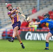 14 July 2007; Michelle Hearne, Wexford, has her shot blocked by Suzanne Kelly, Tipperary. Gala All-Ireland Camogie O'Duffy Cup, Senior A Championship, Tipperary v Wexford, Semple Stadium, Thurles, Co. Tipperary. Picture credit: Brendan Moran / SPORTSFILE