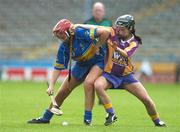 14 July 2007; Cora Hennessy, Tipperary, in action against Claire O'Connor, Wexford. Gala All-Ireland Camogie O'Duffy Cup, Senior A Championship, Tipperary v Wexford, Semple Stadium, Thurles, Co. Tipperary. Picture credit: Brendan Moran / SPORTSFILE