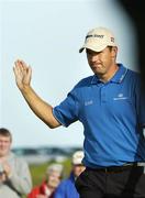 14 July 2007; Padraig Harrington acknowledges the crowd after putting on the 18th to win the Irish PGA Golf Championship, Final Round, European Club Golf Club, Brittas Bay, Co. Wicklow. Picture credit: Ray Lohan / SPORTSFILE *** Local Caption ***