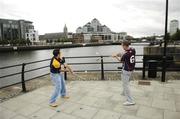 11 July 2007; Galway's John Lee, right, and Antrim's Michael Herron puck sliothars into the Liffey after a GAA Unrivalled photocall ahead of their Guinness All-Ireland Hurling Championship Qualifier on Saturday next. Jurys Inn Custom House, Custom House Quay, Dublin. Picture credit: Brendan Moran / SPORTSFILE