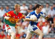 15 July 2007; Conor Meredith, Laois, breaks clear of Carlow full-back Alan Callinan on his way to score the first goal of the game. ESB Leinster Minor Football Championship Final, Laois v Carlow, Croke Park, Dublin. Picture credit: Ray McManus / SPORTSFILE
