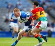 15 July 2007; Eddie Kelly, Laois, in action against Barry John Molley, Carlow. ESB Leinster Minor Football Championship Final, Laois v Carlow, Croke Park, Dublin. Picture credit: Ray McManus / SPORTSFILE