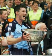 15 July 2007; Dublin captain Colin Moran celebrates with the Delaney Cup after the game. Bank of Ireland Leinster Senior Football Championship Final, Dublin v Laois, Croke Park, Dublin. Picture credit: Brendan Moran / SPORTSFILE