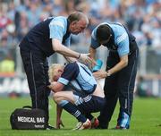 15 July 2007; Mark Vaughan, Dublin, is treated by the Dublin medical staff late in the game. Bank of Ireland Leinster Senior Football Championship Final, Dublin v Laois, Croke Park, Dublin. Picture credit: Brendan Moran / SPORTSFILE