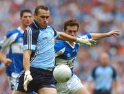 15 July 2007; Ciaran Whelan, Dublin, in action against Pauric McMahon, Laois. Bank of Ireland Leinster Senior Football Championship Final, Dublin v Laois, Croke Park, Dublin. Picture credit: Brendan Moran / SPORTSFILE