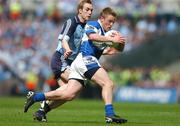 15 July 2007; Ross Munnelly, Laois, in action against Paul Griffin, Dublin. Bank of Ireland Leinster Senior Football Championship Final, Dublin v Laois, Croke Park, Dublin. Picture credit: Brendan Moran / SPORTSFILE