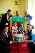 18 July 2007; Davin Shelley, left, aged 9, from Howth, Co. Dublin, and Dylan Hennessy, aged 4, from Sutton, Co. Dublin, with Dublin Football Manager Paul Caffrey, back, and Dublin footballers, from left, Jason Sherlock, Ciaran Whelan, Shane Ryan and Colin Moran with Delaney Cup on a visit to Temple Street Children's University Hospital, Temple Street, Dublin. Picture credit: Caroline Quinn / SPORTSFILE