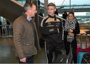27 November 2014; Dublin manager Jim Gavin with Kerry's James O’ Donoghue, right, at Dublin Airport ahead of their trip to Boston for the GAA / GPA Opel All Star Tour 2014. Opel Ireland is the official car partner of the GAA and GPA. For more information check out www.opel.ie #OpelAllStarTour. Dublin Airport, Dublin. Picture credit: Pat Murphy / SPORTSFILE