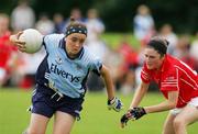 15 July 2007; Niamh McEvoy, Dublin, in action against Anne O'Donovan, Cork. TG4 Ladies All-Ireland Minor Football Final, Dublin v Cork, JJ Brackens GAA Club, Templemore, Co. Tipperary. Picture credit: Kieran Clancy / SPORTSFILE