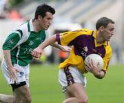 8 July 2007; Colm Morris, Wexford, in action against Ciaran O'Reilly, Fermanagh. Bank of Ireland All-Ireland Senior Football Championship Qualifier, Round 1, Fermanagh v  Wexford, St Tighearnach's Park, Clones, Co. Monaghan. Picture credit: Oliver McVeigh / SPORTSFILE