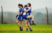 29 November 2014; Castleisland Desmonds captain Lorraine Scanlon, right, celebrates with team-mate Leanne Mangan, as Clonbur captain Aisling Nic Aodhagain reacts at the final whistle. TESCO HomeGrown Intermediate Ladies Football Club Championship Final, Castleisland Desmonds, Kerry v Clonbur, Galway. Corofin, Co. Clare. Picture credit: Diarmuid Greene / SPORTSFILE