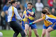 29 November 2014; Lisa Leonard, Murroe Boher, scores a goal against PAula Daly and Niamh Connolly, St. CiaranÕs. TESCO Homegrown All Ireland Junior Club Championship Final, Murroe Boher, Limerick v St. Ciaran's, Roscommon, Ballinasloe, Co. Galway. Picture credit: Ray Ryan / SPORTSFILE