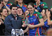 29 November 2014; Paul Adams, Manager of Tesco Ballinasloe, presents the Player of the Match award to Niamh Richardson, Murroe Boher. TESCO Homegrown All Ireland Junior Club Championship Final, Murroe Boher, Limerick v St. Ciaran's, Roscommon, Ballinasloe, Co. Galway. Picture credit: Ray Ryan / SPORTSFILE