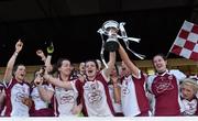 30 November 2014; Termon captain Geraldine McLoughlin lifts the cup as her team-mates celebrate. TESCO HomeGrown All-Ireland Senior Club Championship Final, Termon, Donegal v Mourneabbey, Cork, Tuam Stadium, Tuam, Co. Galway. Picture credit: Matt Browne / SPORTSFILE