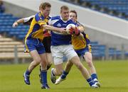 4 August 2007; Donal Kingston, Laois, in action against Eamon Bannon, left, and Kevin Higgins, Roscommon. ESB All-Ireland Minor Football Quarter Final, Laois v Roscommon, Semple stadium, Thurles, Co.Tipperary. Picture credit; Matt Browne / SPORTSFILE