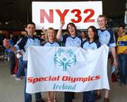 2 August 2007; Members of the Team NY 32, from left, Alan Smith, from Donnybrook, Lesley Simonson, from Glasnevin, Annette Cullen, Blackhorse Ave, Adriana Holland, from Malahide, and Garry Grimes, from Naul, before departing from Dublin Airport to paticpate in the New York City Half Marathon. Team NY 32, which is made up of representatives from every county in Ireland are on their way to the New York City Half Marathon to help raise funds to recruit more athletes into the Special Olympics programme around the country. Wearing the 32 county jerseys, sponsored by O'Neill's Sports, Azzuri & Gaelic Gear, the team will participate in the 13mile (almost 22kms) run through the streets of the 'Big Apple' in under three hours on Sunday the 5th August 2007.  Dublin Airport, Dublin. Picture credit: Brian Lawless / SPORTSFILE