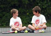 6 August 2007; Dublin's young tennis aces battled it out at St. Annes Park, Raheny, to scoop one of the prizes on offer at the Dublin final of the nationwide KitKat Parks Tennis programme. Over the past five weeks in 52 venues across Dublin, Ireland's top tennis coaches have put thousands of children aged between 6 and 17 years through their paces in the annual KitKat Parks Tennis Leagues. The programme culminated in an exciting grand slam final giving Ireland’s next Roger Federa or Serena Williams the opportunity to be discovered. At the finals are Adam Boyle, left, age 9, Skerries Summer Camp, with Dean Lacey, age 9. St Anne's Park, Raheny, Dublin. Picture credit: Brian Lawless / SPORTSFILE