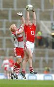 11 August 2007; Brian Kelleher, Cork, in action against Ciaran McFeeley, Derry. ESB All-Ireland Minor Football Quarter-Final, Cork v Derry, Croke Park, Dublin. Picture credit; Pat Murphy / SPORTSFILE