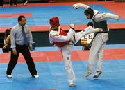 10 August 2007; Irish Welter Weight (78kg) Mark Casserly, from Tallaght, representing DCU and Ireland, in action against Isaac Estevan, Spain. Mark lost his opening bout 2-3 knocking him out of the competition. World University Games 2007, Taekwondo Competition, Gym 6, Thammasat University, Bangkok, Thailand. Picture credit: Brian Lawless / SPORTSFILE