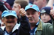 11 August 2007; Two Dublin supporters on Hill 16. Bank of Ireland All-Ireland Senior Football Championship Quarter-Final, Dublin v Derry, Croke Park, Dublin. Picture credit; Ray McManus / SPORTSFILE