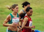 12 August 2007; Orla Drumm, from Ballyclough, Limerick, representing UCC and Ireland, in action during the Women's 1500m Final. Ireland were represented in the final by Deirdre Byrne, from Avoca, Co. Wicklow, representing California Polytechnic State University, who finished 8th with a time of 4:16.58, and Orla Drumm, from Ballyclough, Limerick, representing UCC, who finished 10th with a time of 4:22.78. World University Games 2007, Women's 1500m Final, Main Stadium, Thammasat University, Bangkok, Thailand. Picture credit: Brian Lawless / SPORTSFILE