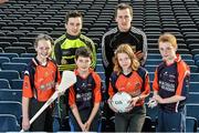 18 December 2014; The GPA Madden Leadership Programme will develop a group of county players from hurling, football and camogie with the necessary skills, motivation and experience to become successful leaders in the community. The Programme, which will run initially for three years, is a bespoke, one-year blended learning Leadership Course which will be delivered by the Gaelic Players Association in conjunction with independent leadership experts. Pictured at the launch of GPA Madden Leadership Programme are Scoil Neasáin Harmonstown pupils, from left, Ellen Potts, age 11, Niall O Cairbre, age 11, Rachel Nic Aonghusa, age 12, and Cúán O Maoileoin, age 12, with Kerry footballer Paul Murphy, left, and Mayo footballer Cillian O'Connor, right. Croke Park, Dublin. Picture credit: Ramsey Cardy / SPORTSFILE