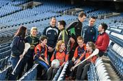 18 December 2014; The GPA Madden Leadership Programme will develop a group of county players from hurling, football and camogie with the necessary skills, motivation and experience to become successful leaders in the community. The Programme, which will run initially for three years, is a bespoke, one-year blended learning Leadership Course which will be delivered by the Gaelic Players Association in conjunction with independent leadership experts. Pictured at the launch of GPA Madden Leadership Programme are, from left, Wexford camogie star Ursula Jacob, Mayo ladies football star Fiona McHale, Armagh footballer Ciaran McKeever, Kerry footballer Paul Murphy, Mayo footballer Cillian O'Connor, Dublin footballer Ger Brennan and Limerick hurler Seamus Hickey with Scoil Neasáin Harmonstown pupils, from left, Rachel Nic Aonghusa, age 12, Niall O Cairbre, age 11, Cúán O Maoileoin, age 12, and Ellen Potts, age 11. Croke Park, Dublin. Picture credit: Ramsey Cardy / SPORTSFILE