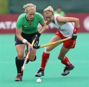 18 August 2007; Nikki Symmons, Ireland, in action against Jo Ellis, England. 2007 EuroHockey Nations Championships, Womens, Pool A, Ireland v England, Belle Vue Hockey Centre, Kirkmanshulme Lane, Belle Vue, Manchester, England. Picture credit: Oliver McVeigh / SPORTSFILE
