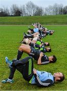 22 December 2014; Munster players including Johne Murphy, Donncha O'Callaghan and Billy Holland stretch during squad training ahead of their Guinness PRO12, Round 11, match against Leinster on Friday. Munster Rugby Squad Training, University of Limerick, Limerick Picture credit: Diarmuid Greene / SPORTSFILE