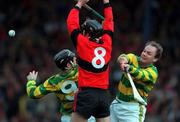 31 October 1999; Eddie Enright of UCC in action against Michael Harrington, left, and Liam Meaney of Blackrock during the Cork County Senior Club Hurling Championship Final match between Blackrock and UCC at Páirc Uí Chaoimh in Cork. Photo by Brendan Moran/Sportsfile