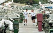 23 November 1999; Republic of Ireland players Graham Barrett, left and Liam Miller near the team hotel, Les Lapins, at the Ta'Xbiex Yacht Marina in Malta. Photo by David Maher/Sportsfile