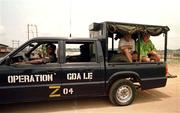 1 April 1999; Manager Brian Kerr, left, and assistant manager Noel O'Reilly arrive back to the team hotel, after a lift from the local police, after a Republic of Ireland U20 Squad training sesssion at the Liberty Stadium in Ibadan, Nigeria. Photo by David Maher/Sportsfile