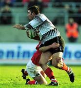 20 November 1999; Rory Greenslade-Jones of Pontypridd in action against Peter Stringer of Munster during the Heineken Cup Pool 4 Round 1 match between Munster and Pontypridd at Thomond Park in Limerick. Photo by Ray Lohan/Sportsfile