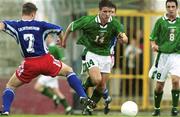 22 November 1999;  Shaun Byrne of Republic of Ireland in action against Monte Rheinberger of Liechtenstein during the UEFA Under 18 Championship Preliminary Round match between Republic of Ireland and Liechenstein at the National Stadium in Ta' Qali, Malta. Photo by David Maher/Sportsfile