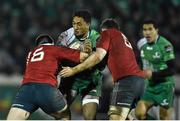 1 January 2015; Bundee Aki, Connacht, is tackled by Kevin O'Byrne, left, and Peter O'Mahony, Munster. Connacht v Munster, Guinness PRO12 Round 12. Sportsground, Galway. Picture credit: Ramsey Cardy / SPORTSFILE